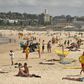 Bondi Beach was closed after sunbathers flouted a ban on non-essential outdoor gatherings of more than 500 people