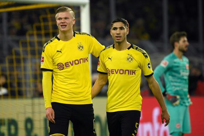 Dortmund forwards Erling Braut Haaland (L) and Achraf Hakimi (R) celebrate Friday's 4-0 win over Eintracht Frankfurt.