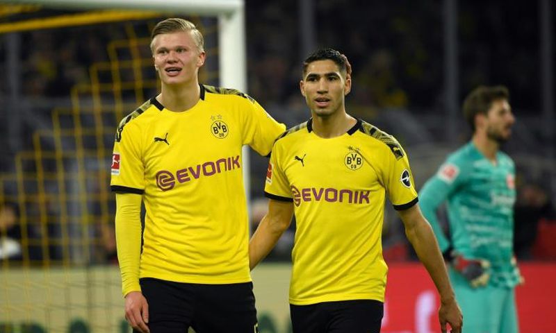 Dortmund forwards Erling Braut Haaland (L) and Achraf Hakimi (R) celebrate Friday's 4-0 win over Eintracht Frankfurt.