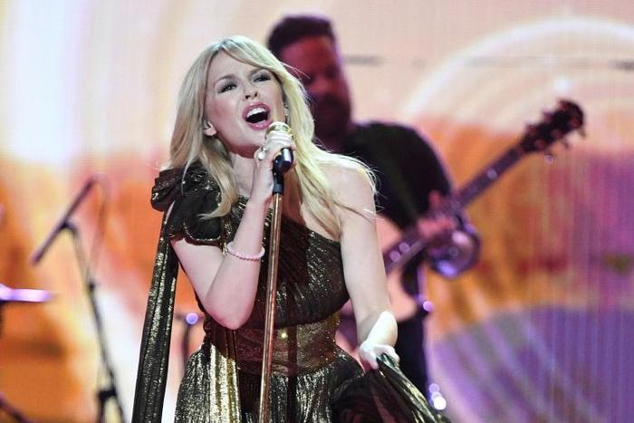 Pop star Kylie Minogue and other famous Australians appear in the tourism ad