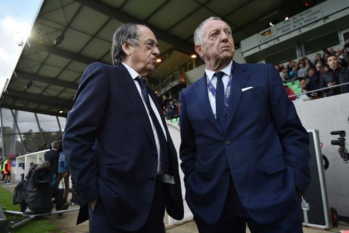 French Football Federation President Noel Le Graet (left) is not happy Lyon president Jean-Michel Aulas (right)