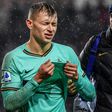 Inter Milan's Italian midfielder Nicolo Barella (L) hurt his knee during a rain-soaked Serie A match at Torino