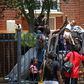 Several hundred asylum-seekers scaled the iron railings of the  United Nations High Commissioner for Refugees office in Pretoria seeking protection