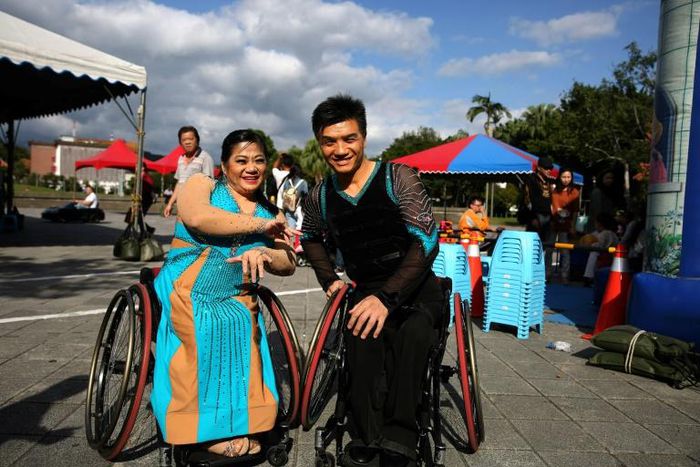Ivy Huang (L) and Vincent Kuo (R) are part of the island's last generation of polio survivors and have spent years perfecting their dance routines