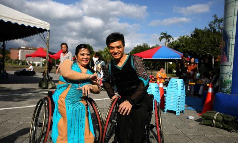 Ivy Huang (L) and Vincent Kuo (R) are part of the island's last generation of polio survivors and have spent years perfecting their dance routines