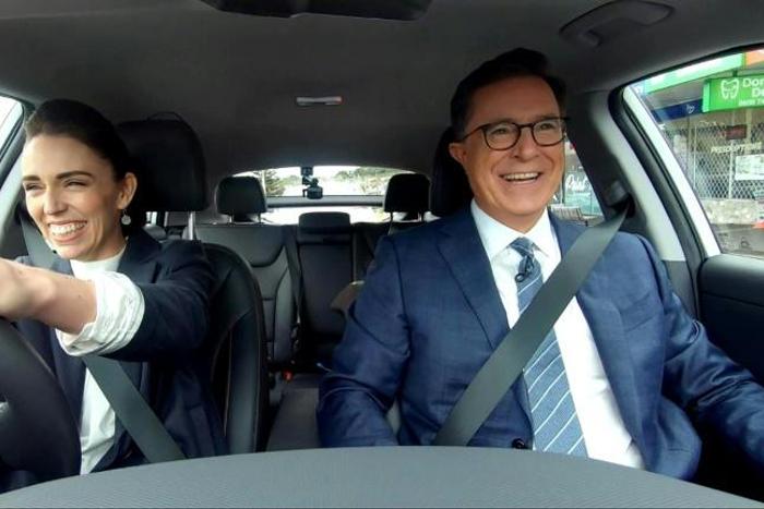 New Zealand Prime Minister Jacinda Ardern driving US talk show host Stephen Colbert after picking him up from the airport in Auckland
