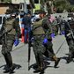 Soldiers assist health personnel in Tegucigalpa, Honduras on March 17, 2020 after two new cases of the new coronavirus were confirmed