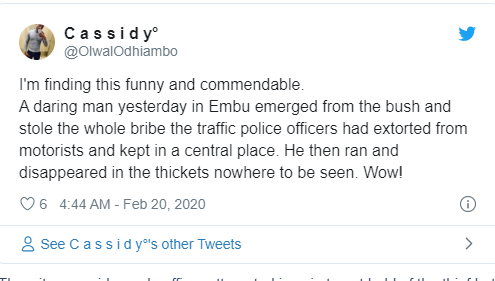 Police officers rain curses on a smart thief who snatched their bribe cash and fled into the bush