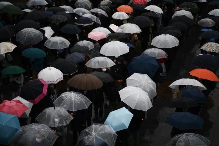 Hundreds of people queued in the rain for a chance to attend the first session in a trial of a man accused of murdering 19 people at a care home for the disabled in Japan