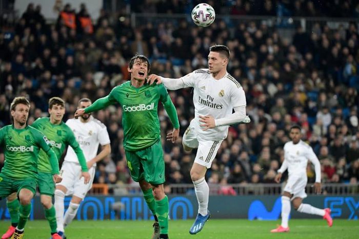 Real Madrid's Luka Jovic (right) says he was given permission to go to Serbia by Real Madrid.