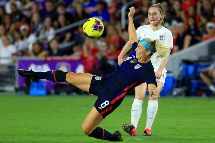 USA midfielder Julie Ertz blocks a pass during her team's 2-0 defeat of England in the SheBelieves Cup friendly tournament