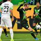 Maxi Arnold's 91st minute volley stopped Borussia Moenchengladbach from return to the top of the table