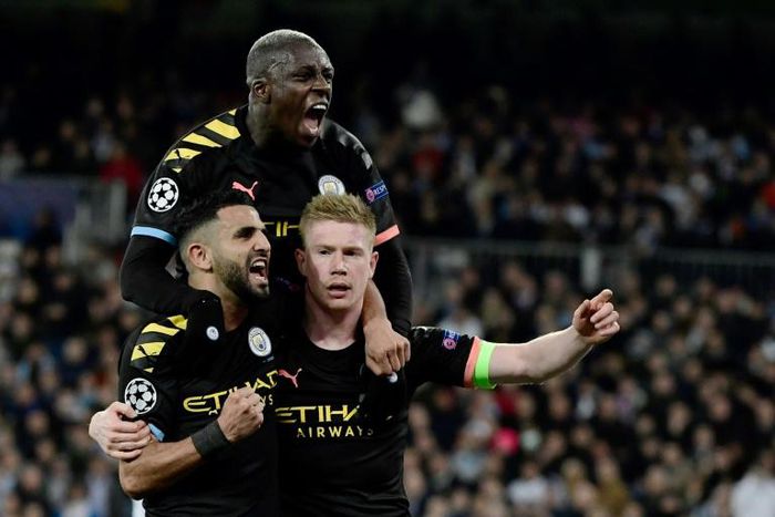 King Kev: Kevin De Bruyne (low, right) scored the winner as Manchester City beat Real Madrid 2-1