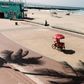 An optimistic ice cream vendor cycles along a deserted beach in Durban, South Africa. Tourism is one of the key African sectors hit by the coronavirus pandemic
