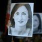 Protesters (pictured November 2019) hold pictures of late journalist Daphne Caruana Galizia, who was investigating allegations of bribes to public officials when she was killed by a car bomb