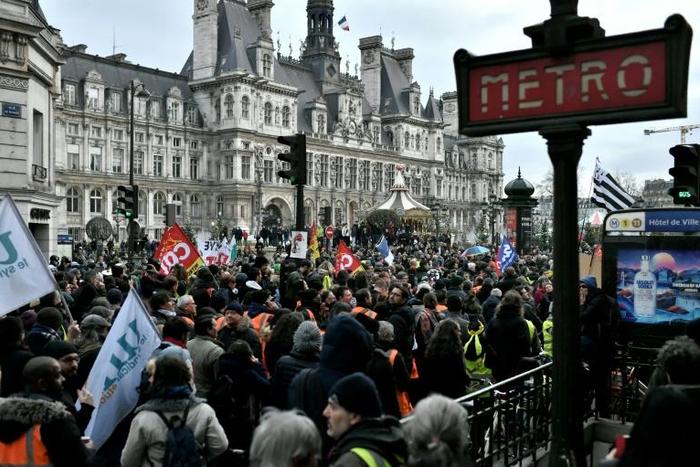 Protesters rallied outside city hall in Paris on Saturday, December 28, against the government's planned pension overhaul.