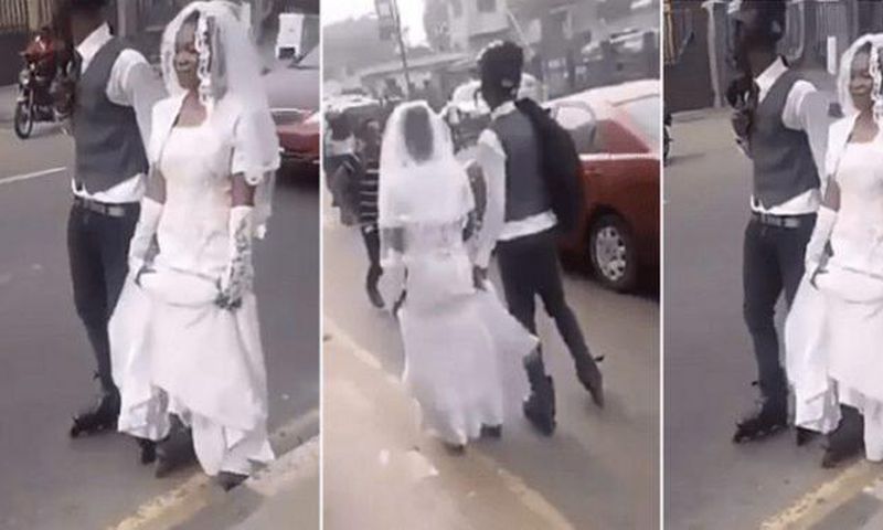Newly-wedded couple falls flat as groom shows of his skating prowess (video)