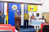 General Manager of Wilmar Africa, Kwame Wiafe speaking at the press briefing with Head of Marketing, Patience Mpereh holding the dummy cheque
