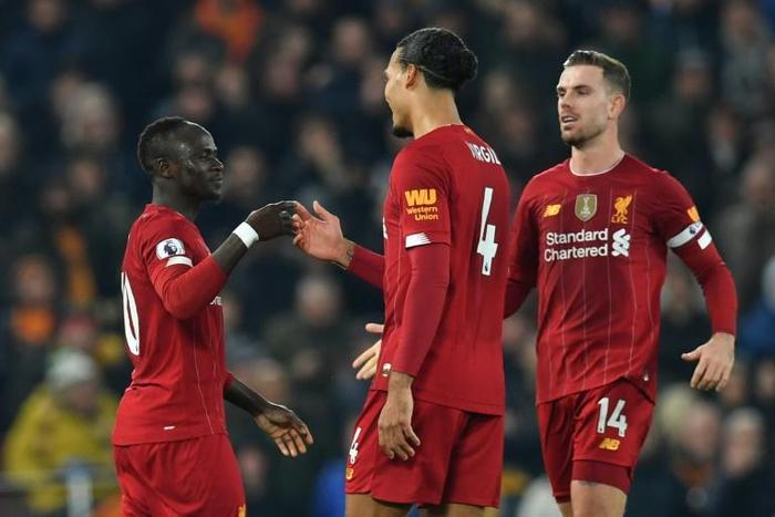 Sadio Mane (left) celebrates the only goal as Liverpool beat Wolves 1-0