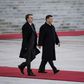 President Jair Bolsonaro (L) will walk a diplomatic tightrope as he hosts his Chinese counterpart Xi Jinping (R) in Brazil
