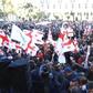 IMAGES Thousands of opposition supporters rallied in Georgia on Sunday, demanding the government's resignation and early parliamentary polls after the increasingly unpopular ruling party backtracked on promised electoral reforms.
Protesters gathered ou...