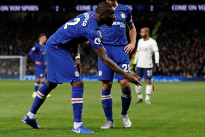 Crowd target - Chelsea's Antonio Rudiger, pictured throwing an object off the pitch, was on the receiving end of "racist songs" from home fans during a 2-0 win away to Tottenham Hotspur on Sunday, according to Blues captain Cesar Azpilicueta