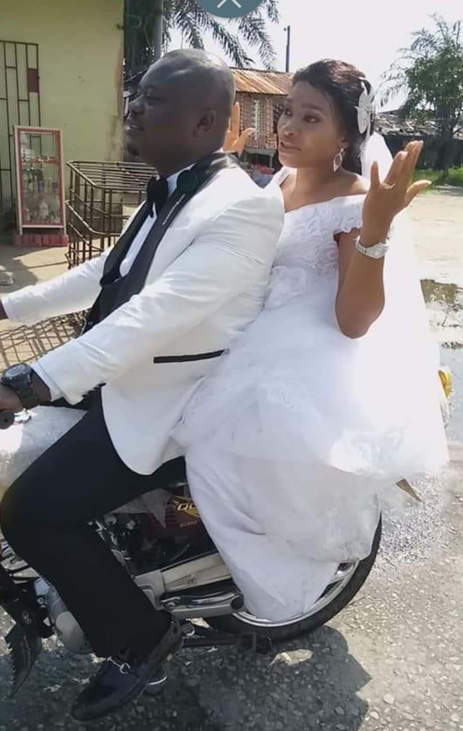 Frugal couple rides a motorbike to their marital home after wedding