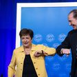 IMF Managing Director Kristalina Georgieva and World Bank Group President David Malpass bump elbows at the end of a joint press briefing on COVID-19 where they called for an all-out, coordinated global response