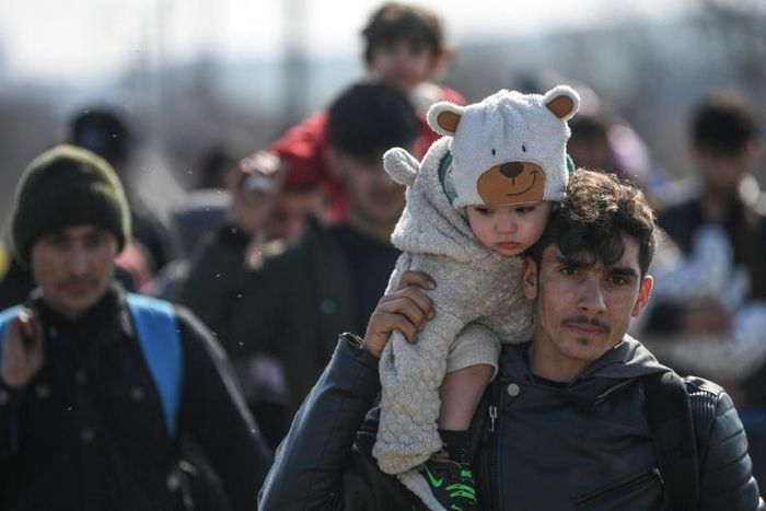Some 13,000 migrants have amassed at the Turkey-Greece border, including families with young children who spent the night in the cold
