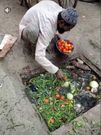 Disturbing photos show vegetable vendor collecting them from a dirty gutter