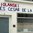 Posters with a play on words combining the word rape in French with the name of Polish-French filmmaker Roman Polanski, and reading "Violanski, the Cesars of shame" plastered on n the headquarters of the French film academy ahead of its 'Cesar' award