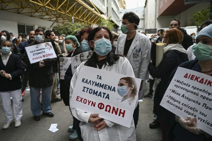 Health workers in Greece demonstrated on Tuesday calling for more help from the government to fight coronavirus