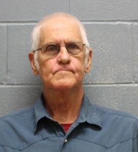 Mother, grandmother and grandfather accused of locking children in wooden cages