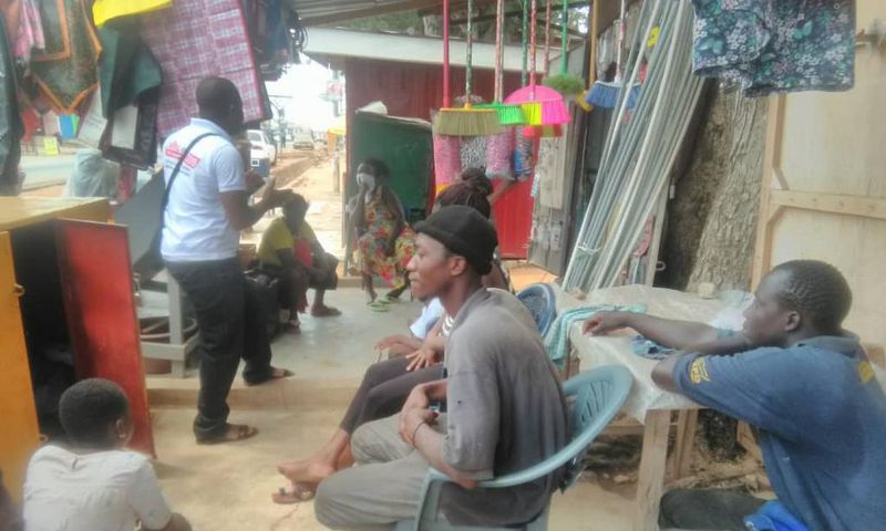 The municipal director, Mr Fidel Nii - Akuffo Bortey, sensitizing residents on COVID-19