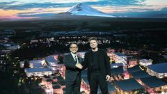 Toyota President and CEO Akio Toyoda (L) and Danish architect Bjarke Ingel reveal plans for a prototype "city" of the future at the base of Mt. Fuji in Japan during the Toyota press conference at the 2020 Consumer Electronics Show