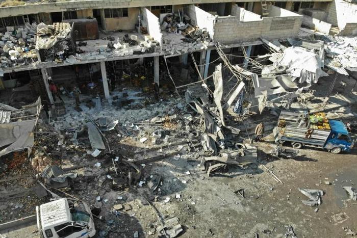 An aerial view shows the destruction following a regime air strike in a market in the town of Maaret al-Numan in the Syrian province of Idlib