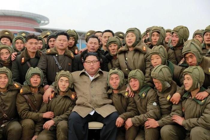 North Korean leader Kim Jong Un (C) and US president Donald Trump flung insults and threats at each other in 2017