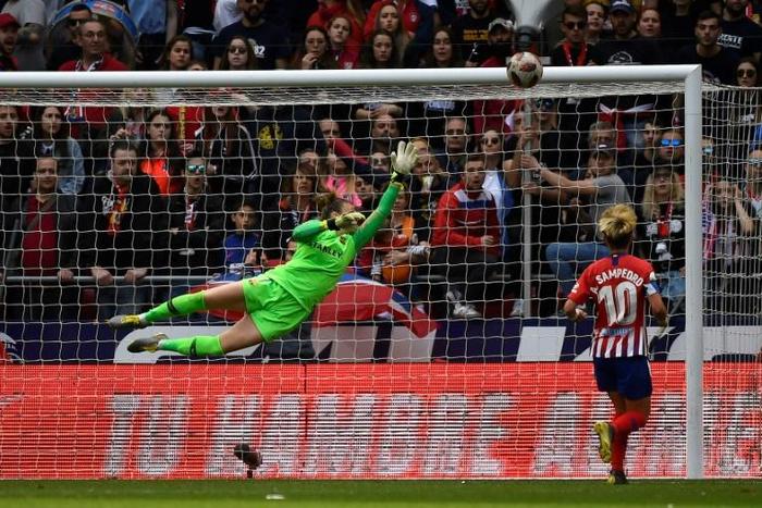 Barcelona goalkeeper Sandra Panos dives to make a save during a match against Atletico Madrid earlier this year.