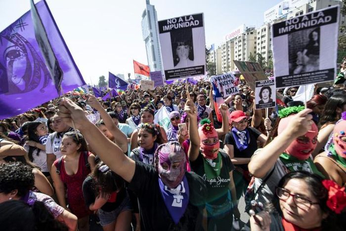 Women demonstrate during a march on International Women's Day in Santiago, Chile
