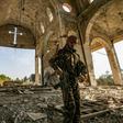 Members of the small Assyrian militia the "Khabur Guards" have taken up the defence of Assyrian towns in the face of a possible Turkish advance