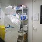 A laboratory operator puts on protective gear before handling patients' samples at the Institut Pasteur in Paris. More than 4,500 cases of coronavirus have been confirmed in China. Several cases have been detected in France, USA and elsewhere.