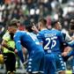 Brescia players, including Mario Balotelli, argue with the referee during a game at Juventus on February 16 in Turin
