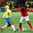 Junior Ajayi (C) of Al Ahly tries to get past Motjeka Madisha (L) and  Gaston Sirino of Mamelodi Sundowns in Cairo Saturday