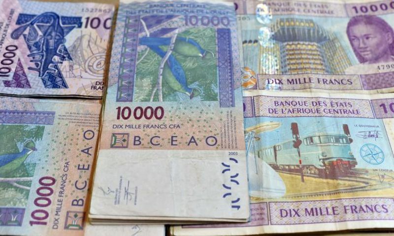 CFA banknotes issued by the  Central Bank of West African States -- but the currency's pegging to the euro is controversial and  politically sensitive, prompting moves to introduce a new currency, the eco