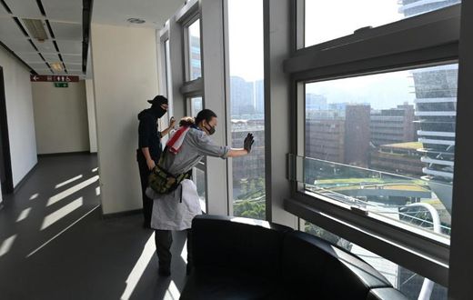 Pro-democracy protesters hiding out the Hong Kong Polytechnic University are fearful and exhausted, but defiant