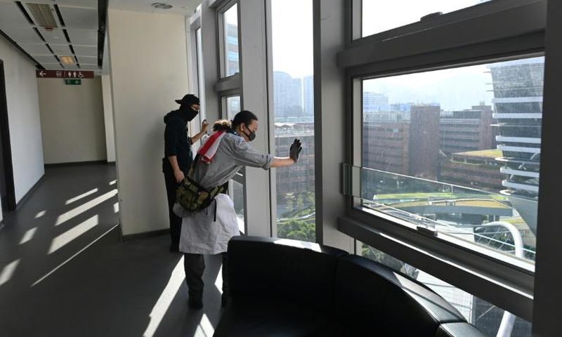 Pro-democracy protesters hiding out the Hong Kong Polytechnic University are fearful and exhausted, but defiant