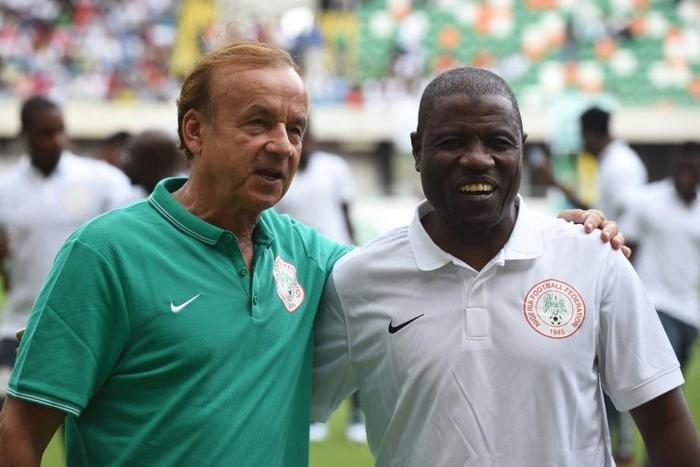 A file photo of assistant Salisu Yusuf (R) posing with Nigeria head coach Gernot Rohr