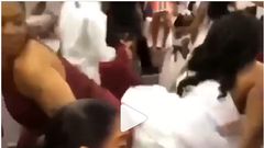Overexcited bride displays her underwear in a crazy twerking at wedding reception