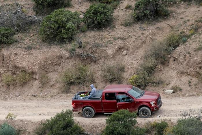 A vehicle transporting a coffin of one of the nine Mormon victims shot dead in Mexico in November 2019