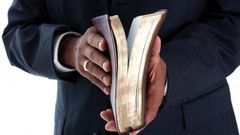 Angry mob beats up preacher after a pack of condoms fell from his Bible